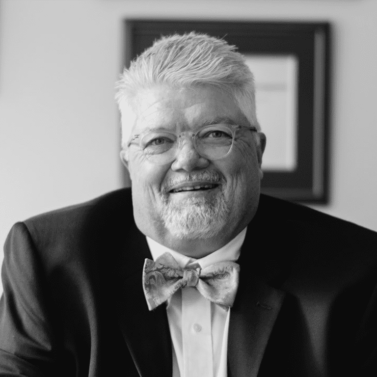 headshot of man with bow tie